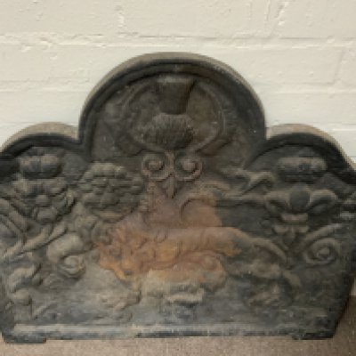 A Cast iron fire back. 76cm x 69cm. NO RESERVE