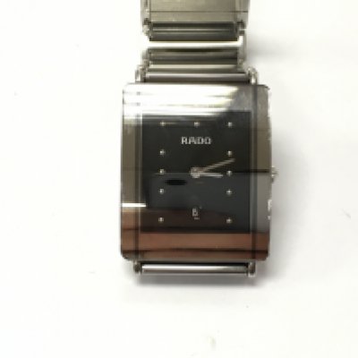 A Rado Diastar wrist watch. 26mm case black dial.