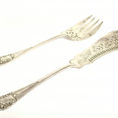 A silver hallmarked fish knife and fork, postage category a