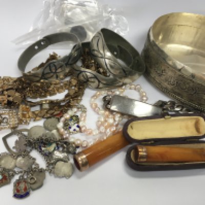 A collection of costume jewellery together with two gold mounted cigarette holders