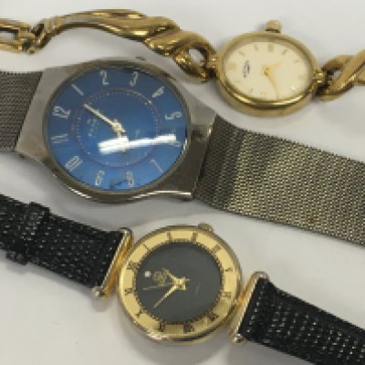 a collection of various dress watches