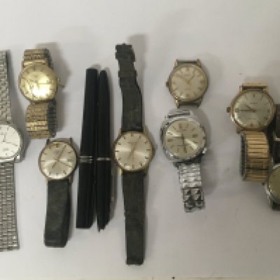 A collection of Vintage Gents watches for spare or repair and two pens.