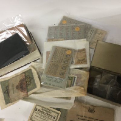 A collection of bank notes some bronze coinage including George III cart wheel pennys military service books and food coupons.