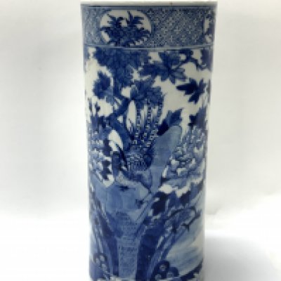 A 20thC Japanese Arita porcelain brush pot with scenes of an Oriental pheasant and fruit tree design. 28cm.
