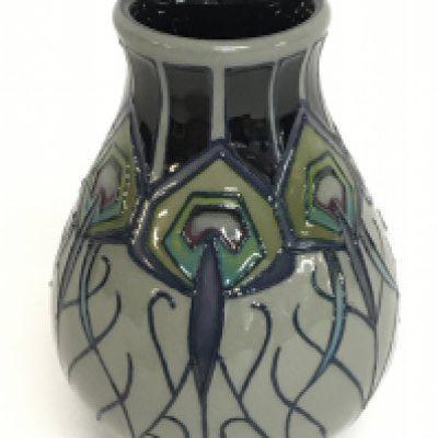 A Moorcroft vase, 10cm tall. No obvious damage or restoration, this lot cannot be posted. NO RESERVE