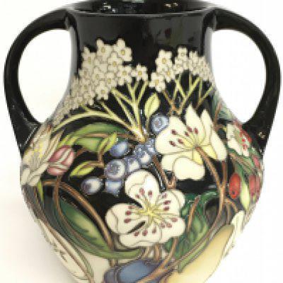A Moorcroft Nicola Slaney two handled vase , 17.5cm tall. No obvious damage or restoration, this lot cannot be posted.