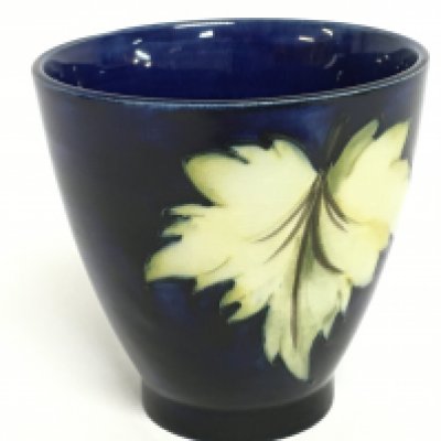 A Moorcroft vase, 9cm tall. No obvious damage or restoration, this lot cannot be posted.