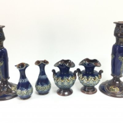 Royal Doulton Lambeth vases and candle sticks. 10 to 19.5cm tall approximately. No obvious large damage or restoration This lot cannot be posted.