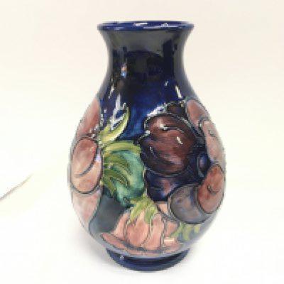 A Moorcroft anemone on blue ground vase.