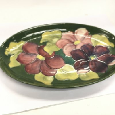 A green hibiscus Moorcroft dish.