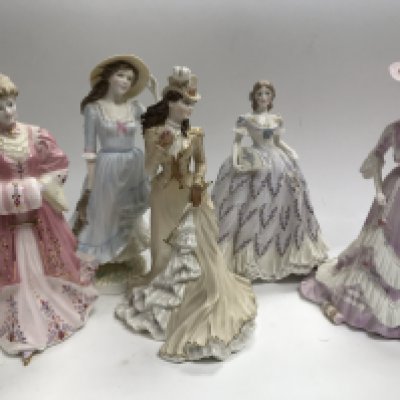 A collection of Worcester and Coalport lady figures.