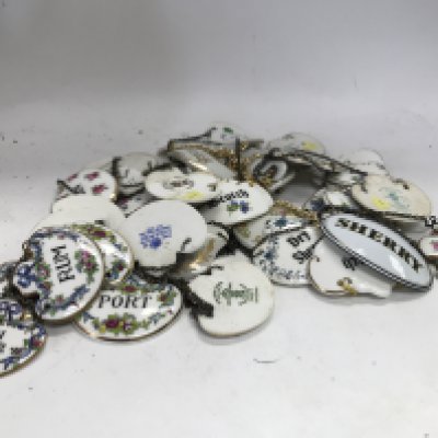 A large collection of ceramic liquor necklets.