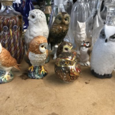A collection of ten Beswick, royal crown derby and other owl ornaments.