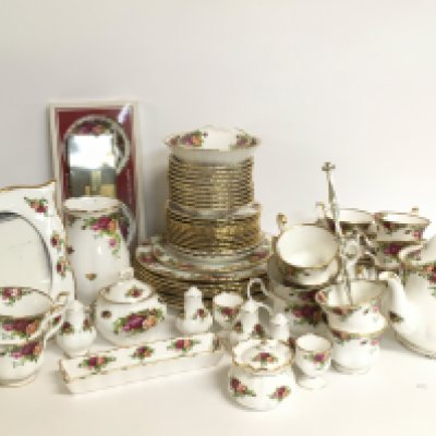 A Royal Albert old English country rose tea dinner set, including cups, plates, salt and pepper shakers etc. this lot cannot be posted