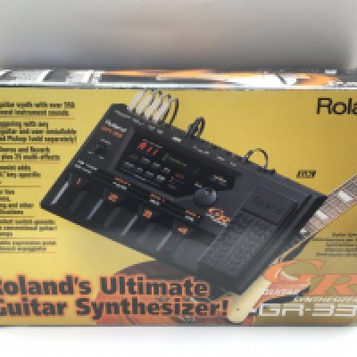 A collection of guitar tools, straps, headphones etc.