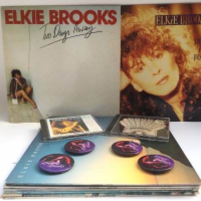 A collection of Elkie Brooks LPs, CDs and fan badges.