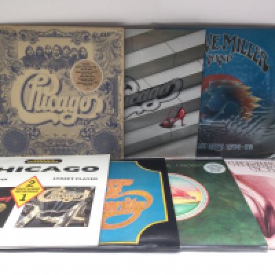 Fourteen soft rock LPs by various artists including Chicago, Heart, Foreigner and others.