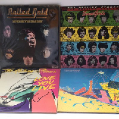 Four Rolling Stones LPs comprising 'Some Girls', 'Love You Live', 'Still Life' and 'Rolled Gold'.