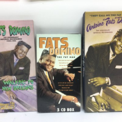 Three Fats Domino CD long boxes.