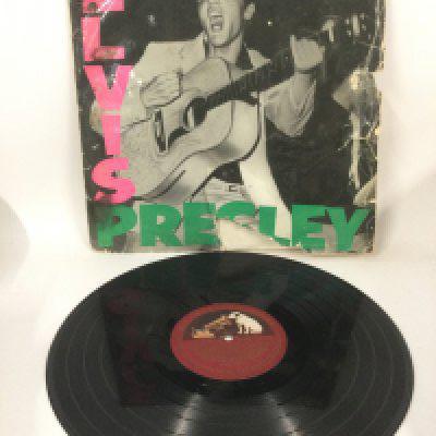 An early UK pressing of Elvis Presley's debut LP 'Rock n Roll' CLP 1093 with 2XAV 255-1N / 2XAV 256-1N matrix numbers. Sleeve poor but vinyl is VG with no visible deep scratches.