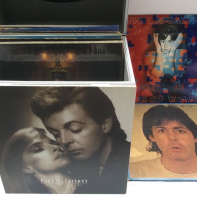 A record case of Paul McCartney, Wings and related LPs including 'Press To Play', 'Ram', 'McCartney' and others.