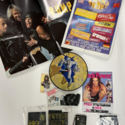 A selection of Heavy Rock, Metal and indie ephemera to include 2 Geffen Records Aerosmith promo poster - printed ephemera for Alice Cooper and Guns N Roses - scarfs for Monsters of Rock and Bon Jovi and an Iron Maiden Clock, flyers etc.