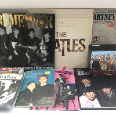A bag of Beatles books, CDs and related ephemera.
