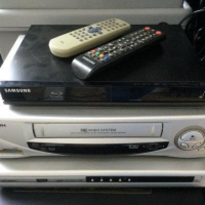 A Samsung BluRay player, a pair of Pioneer CS575 speakers, a Bush DVD player and a Bush video recorder. Comes with remote controls.