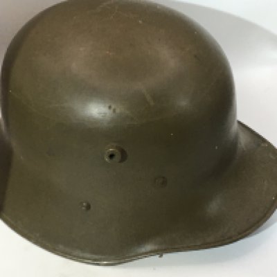 An Austrian or German I world war helmet M16 pattern with leather lined interior.