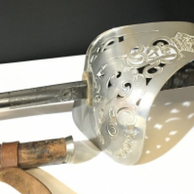 An 1895 Pattern Victorian officers sword with decorated steel blade maker Hawksworth Sheffield.