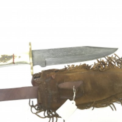 A Native American Bowie Knife with a horn handle and Damascus blade with a traditional North American Indian suede leather scabbard. Length. 43cm