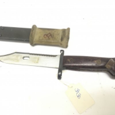 An AK47 Kalashnikov bayonet the scabbard with wire cutter end.