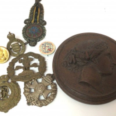 A Rifle Brigade Waterloo cross cap badge South Lancashire Egypt cap badge a Victorian carved wood neo classical plaque and other oddments.