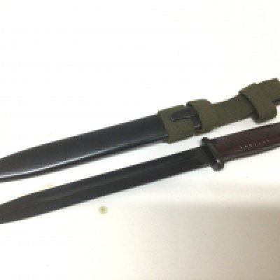 A German Third Reich K98 bayonet with unusual stamp mark 44cqh maker Steitengewchr with metal scabbed and later green woven frog attached.