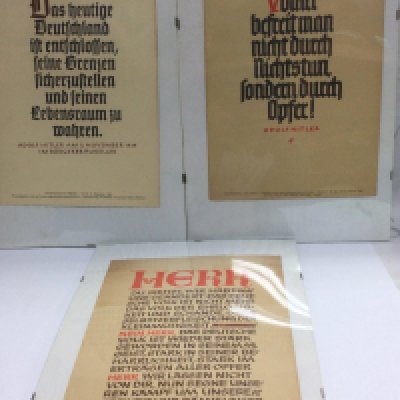 Three Nazi propaganda posters, approx 24cm x 34cm excluding frames. Shipping category B.