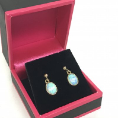 A pair of 9 carat gold and Opal earrings , 1.7g in total. Postage category A