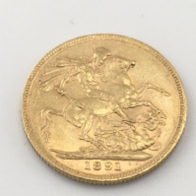 An 1891 full sovereign. Postage cat A.