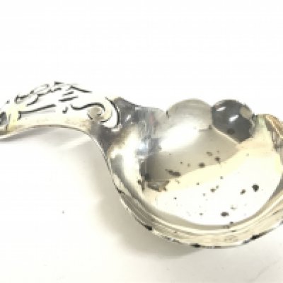A silver Hallmarked caddy spoon, postage category A