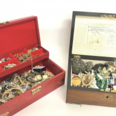 Two boxes of costume jewellery including necklaces, bracelets, brooches. Postage category C