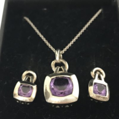 Silver Tanzanite set earrings and pendant on silver chain