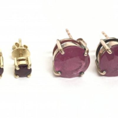 Two pairs of 9 carat gold Ruby set earrings. Overall weight 4.6g. Postage category A