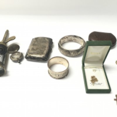 Two 9ct gold chain Approx 2.64g. A silver bangle cigarette case and napkin ring etc.