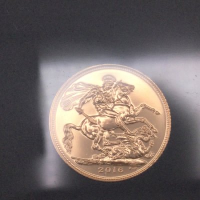 A 2016 full sovereign in case with COA. Postage B