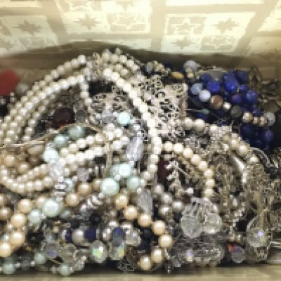 A collection of costume Jewellery including necklaces, rings, brooches etc. Postage category C