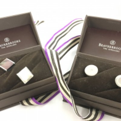 Two pairs of cufflinks, postage category A