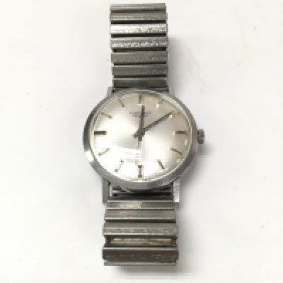 A gents Longines watch.