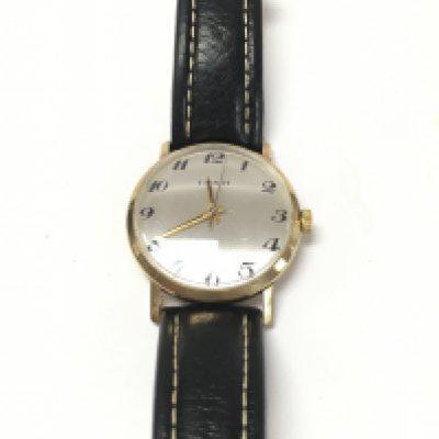 A 9ct gents Tissot wrist watch.