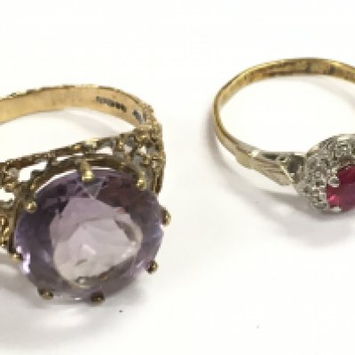 9 carat rings including one set with a amethyst stone and one set with a ruby and diamond shards. Size O and I. Total weight 7g Postage category a