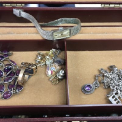 A collection of costume jewellery including silver, 9ct gold bronze core bracelet, various necklaces, brooches. Postage category C
