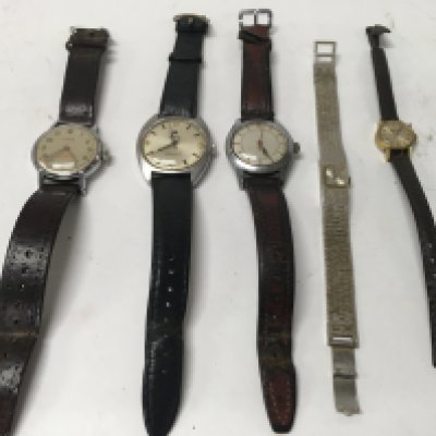 A mixed collection of ladies and gents watches.